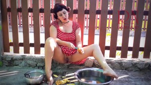 Retro maid prepares potatoes for dinner Vintage performance Vintage maid have no panties Summertime