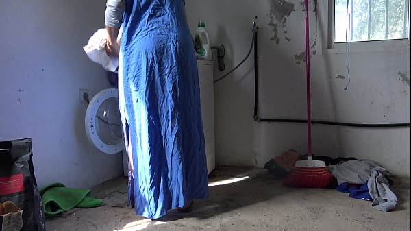 A Muslim maid is fucked doggystyle while doing the laundry